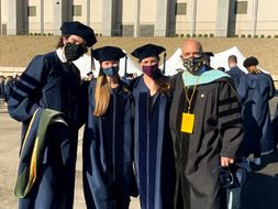 Dr. Zizzi poses with graduates from the doctoral sport psychology program