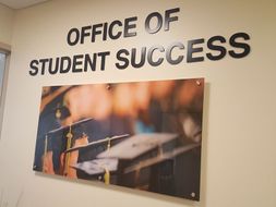 The sign when you first walk into the Office of Student Success