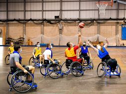 A shot is made during wheelchair basketball