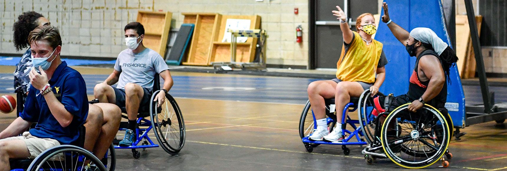 Players celebrating during wheelchair basketball