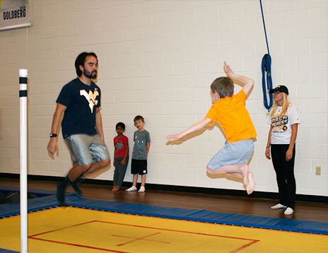 trampoline exercises at a gymnastics class