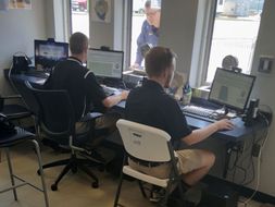 Students working a ticketing office