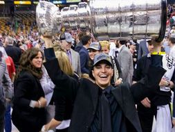 Portrait of Ian Gentile holding the stanley cup.